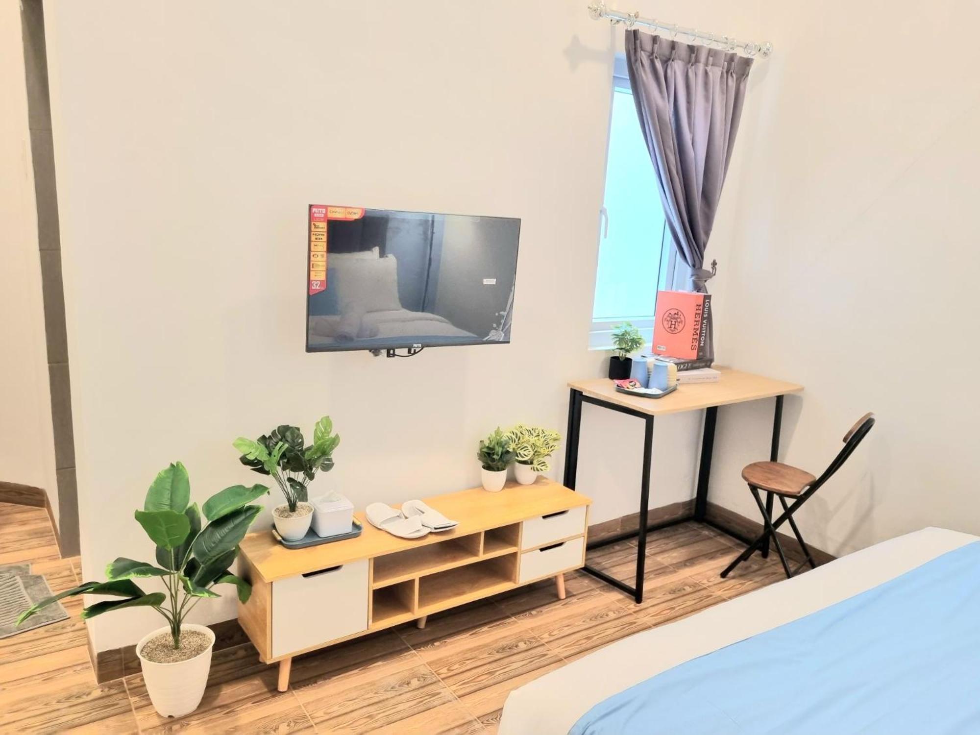Zizi Homey 302 Cemara Asri
