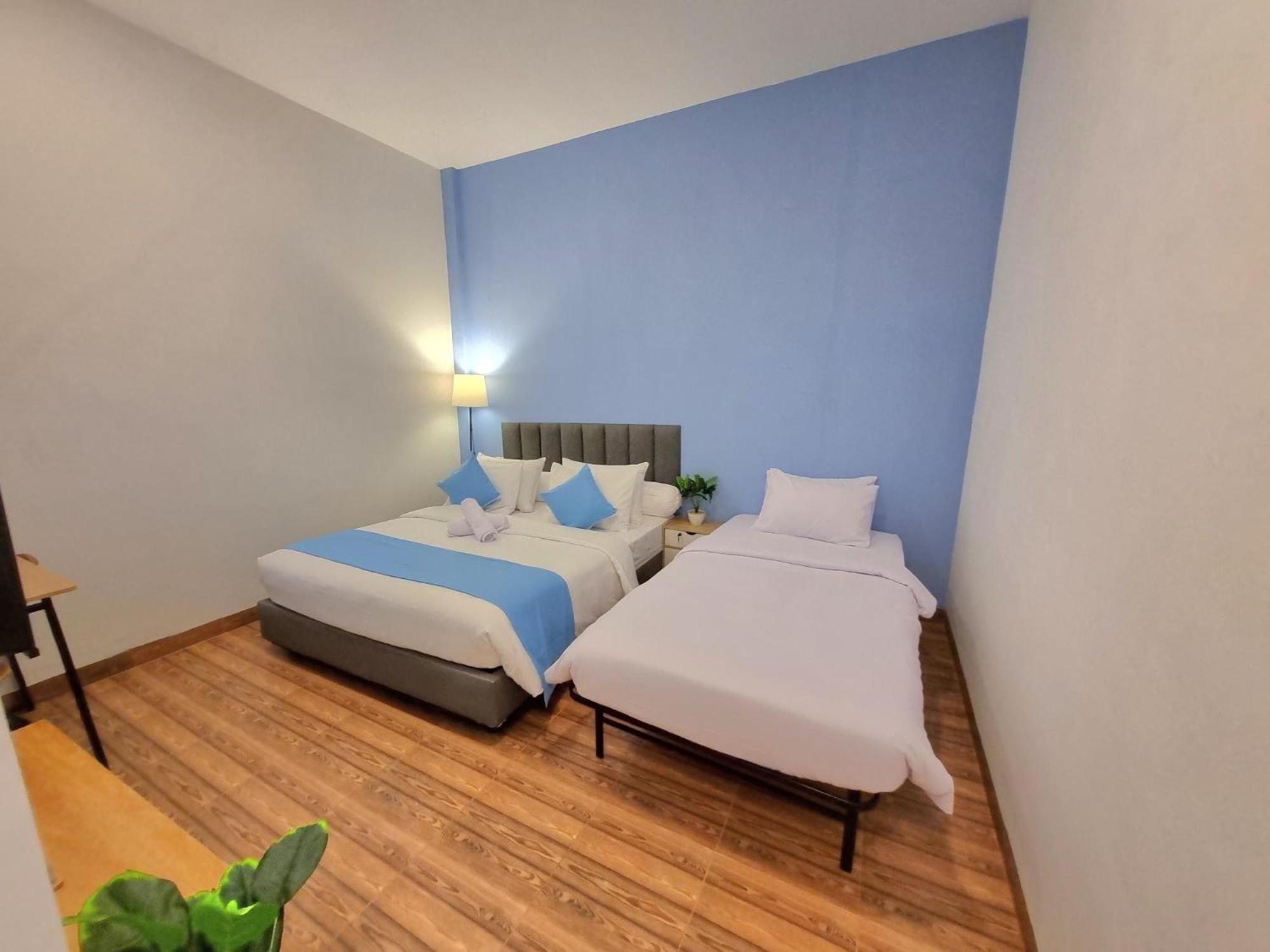 Wisma tamu Zizi Homey 302 Cemara Asri *